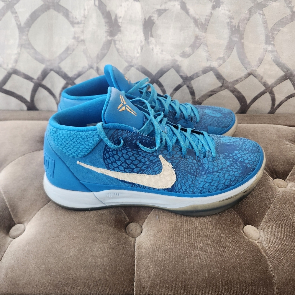 Nike Blue Athletic Shoes with White Swoosh